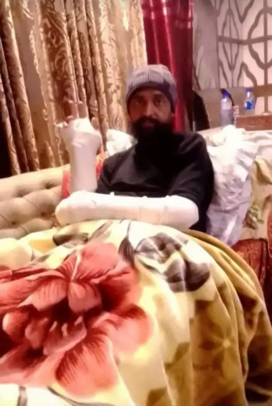 Bandaged Person On Sofa