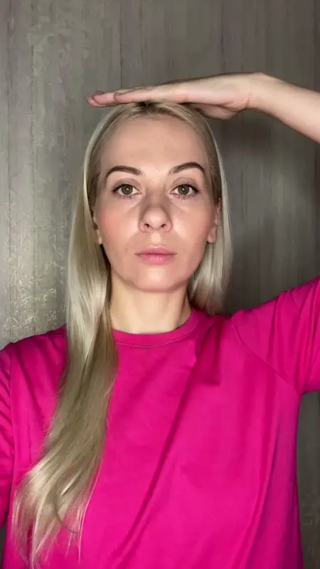 Blonde Woman Hand On Head