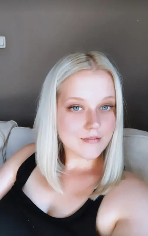 Blonde Woman On Couch