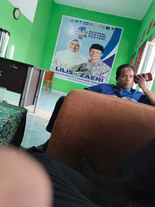 Casual Room With Campaign Poster