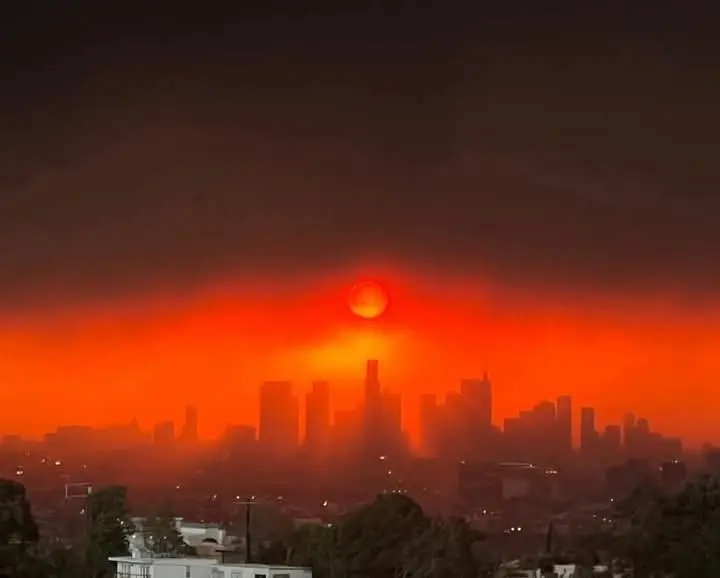 City Skyline Under Fiery Sky
