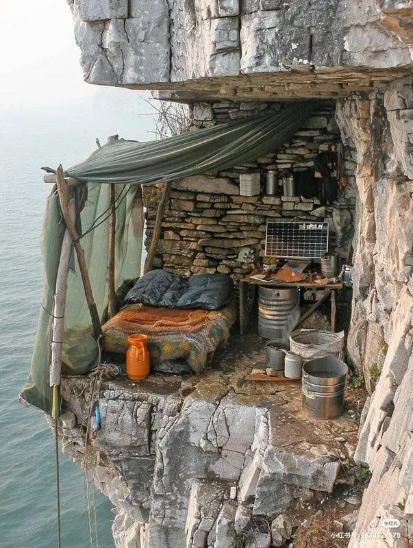 Cliffside Makeshift Shelter With View