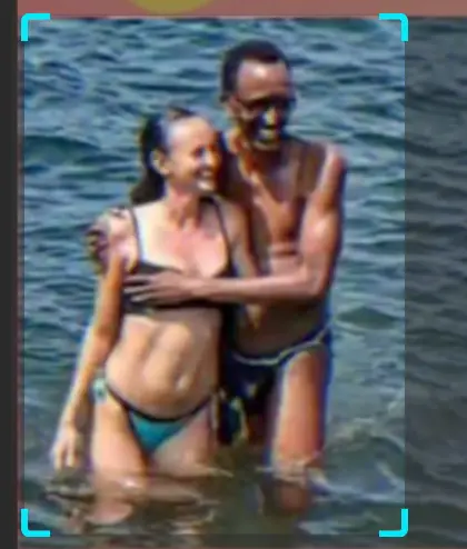 Couple Embracing In Sea