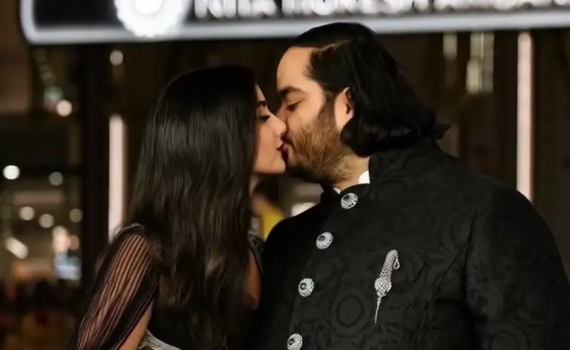 Couple Kissing In Embrace