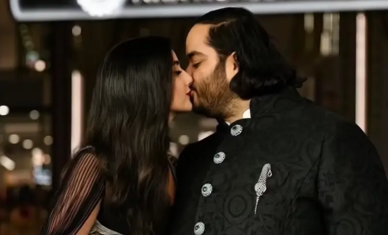 Couple Sharing Formal Kiss