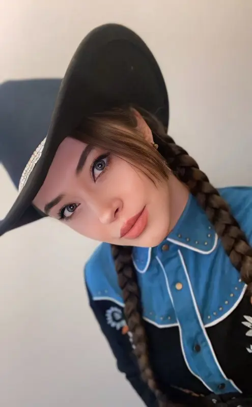 Cowgirl Portrait With Braids