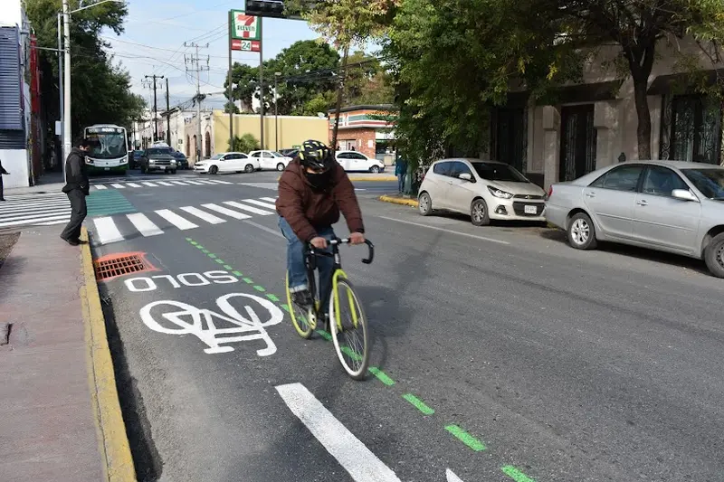 Cyclist In Urban Bike Lane
