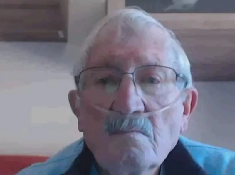 Elderly Man With Oxygen Tube