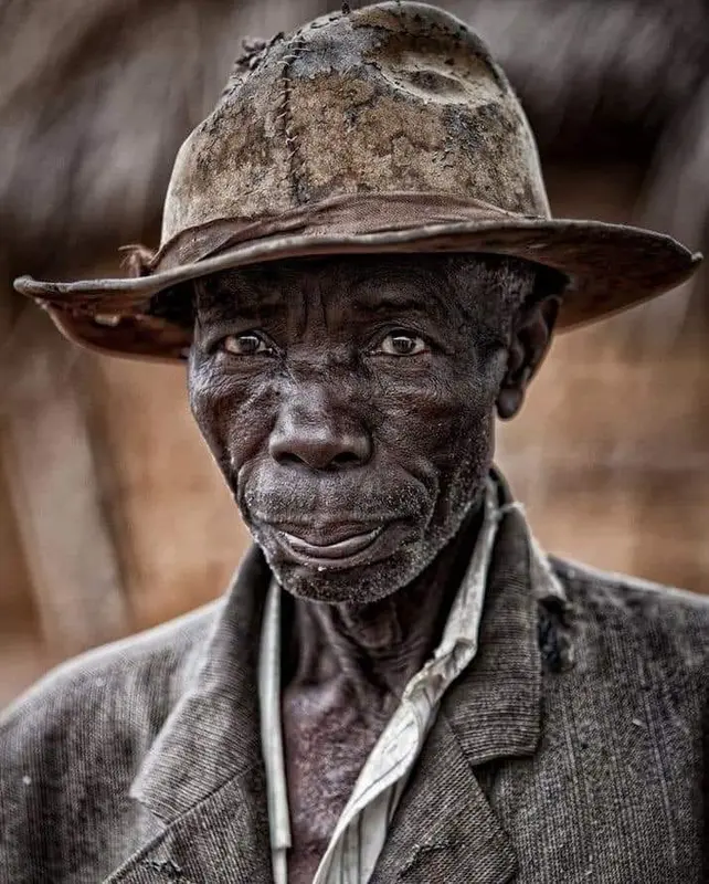 Elderly Man With Weathered Hat