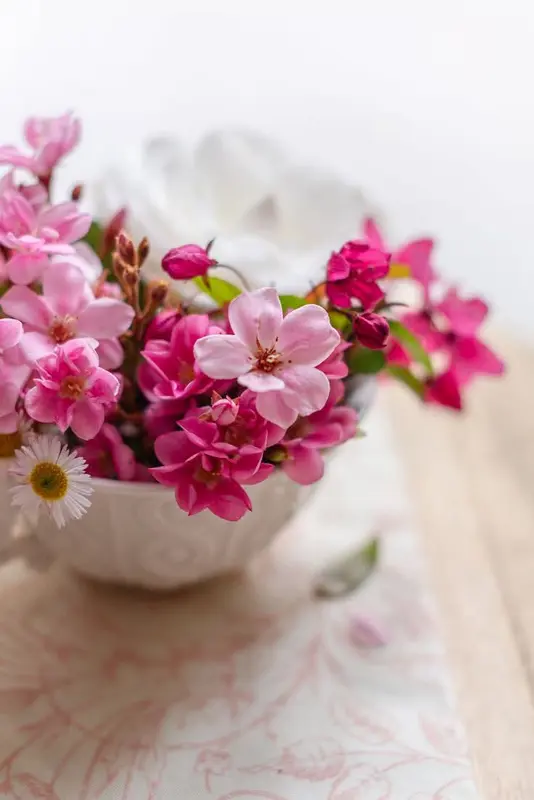 Flowers In A White Teacup