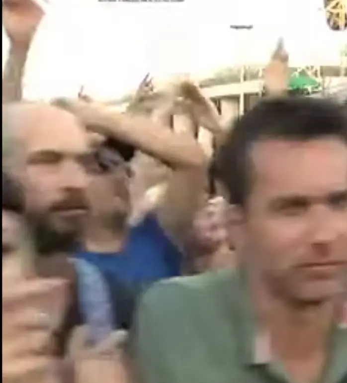 Group Cheering, Hands Raised.