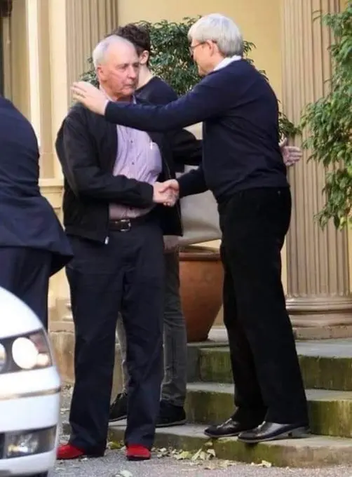 Handshake And Hug Outdoors