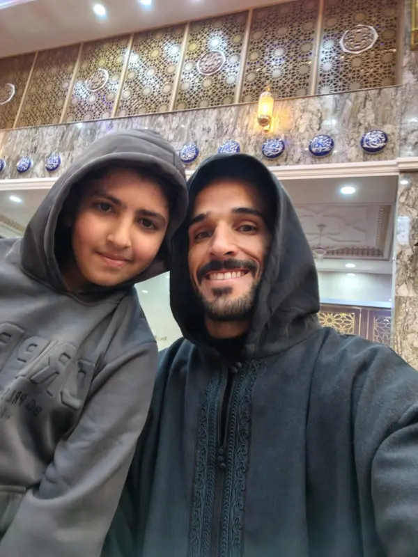 Hooded Duo Ornate Interior Selfie