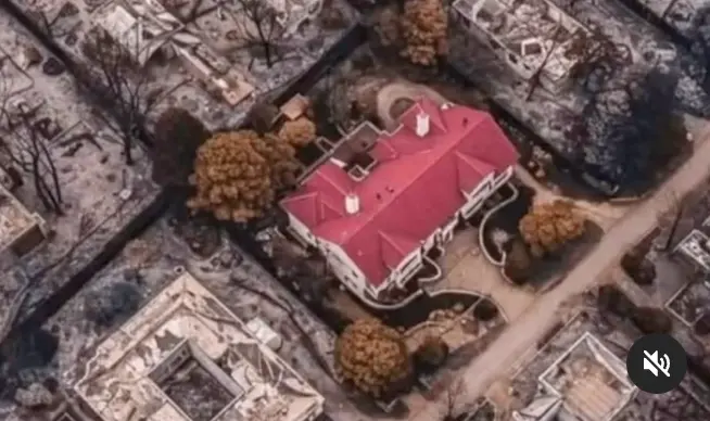 House Intact Amid Fire Ruins