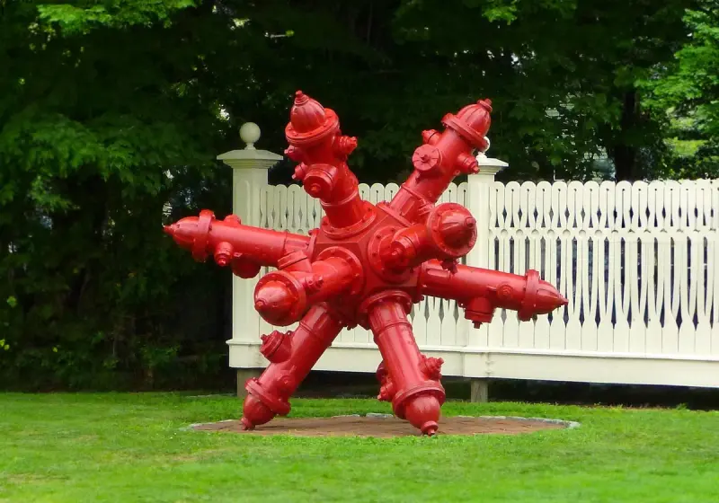 Hydrant Sculpture In Garden