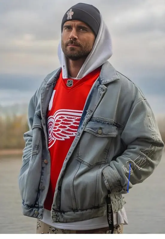 Individual In Layered Outfit Outdoors