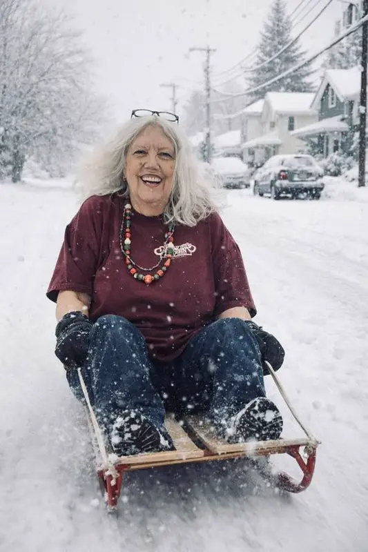 Joyful Sledding In Snow