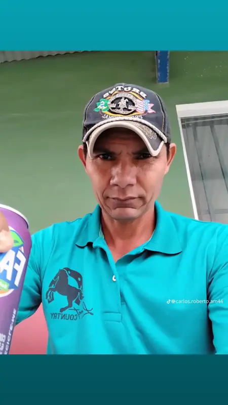 Man Holding Beverage Can