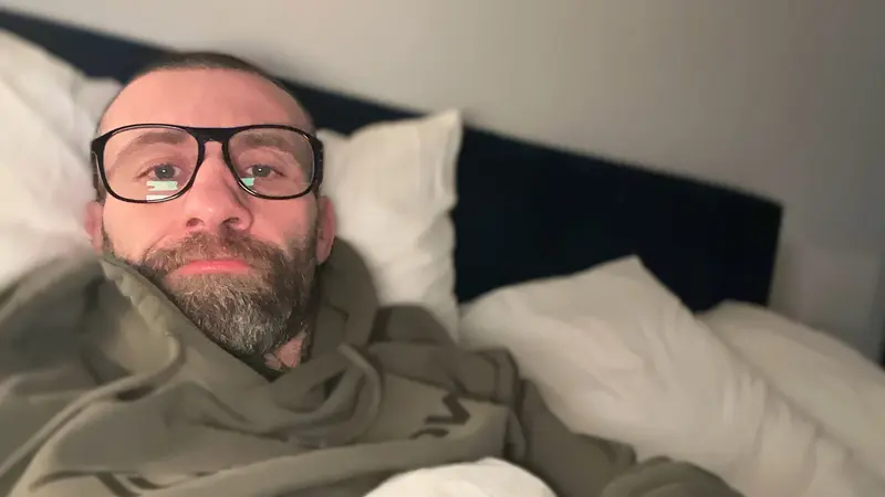 Man In Glasses Lying