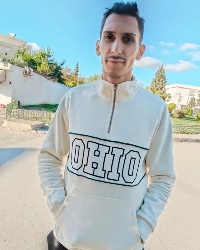 Man In Ohio Sweatshirt Outdoors