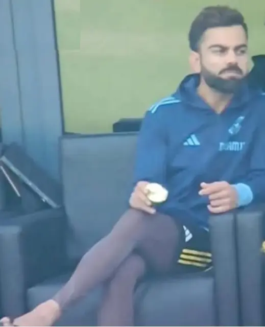 Man Seated With Apple