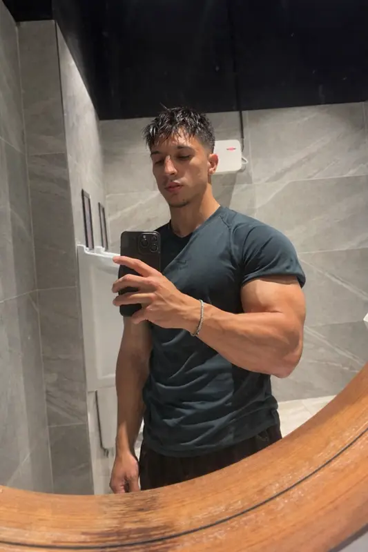 Man's Mirror Selfie Reflection