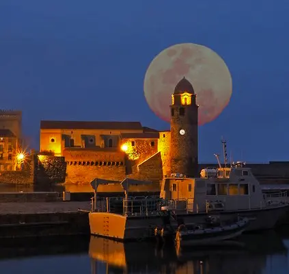 Moonlit Harbor At Night