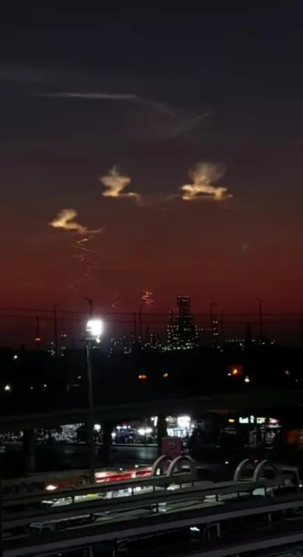 Night Cityscape With Red Sky