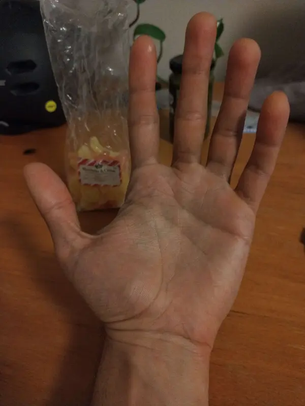 Open Hand With Candy Background