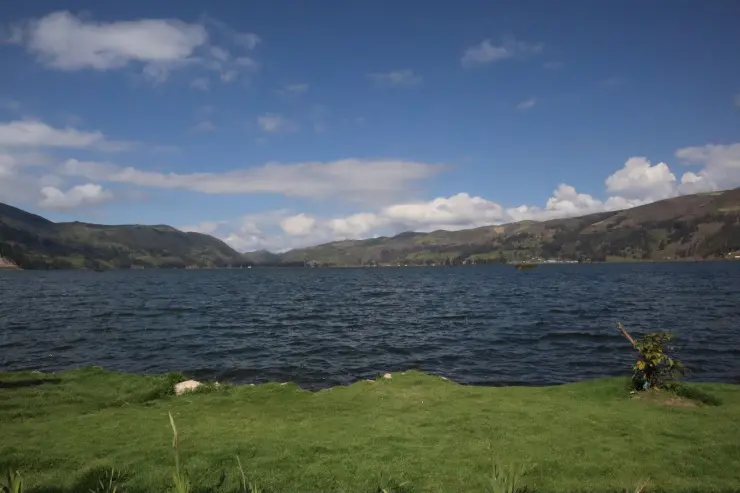 Peaceful Lake With Green Hills