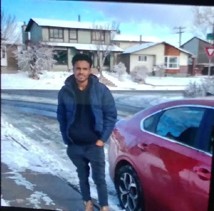 Person By Car In Snow