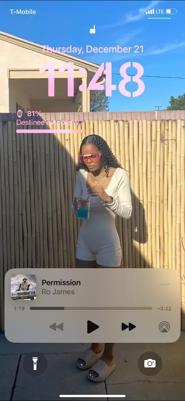 Person Holding Drink Outdoors