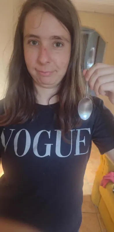 Person Holding Spoon Vogue Shirt