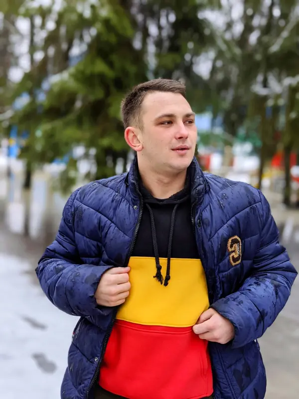 Person In Blue Puffer Jacket