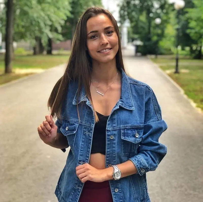 Person In Denim Jacket Outdoors