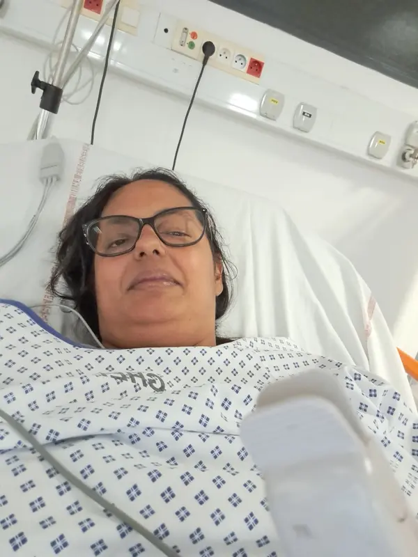 Person In Hospital Bed