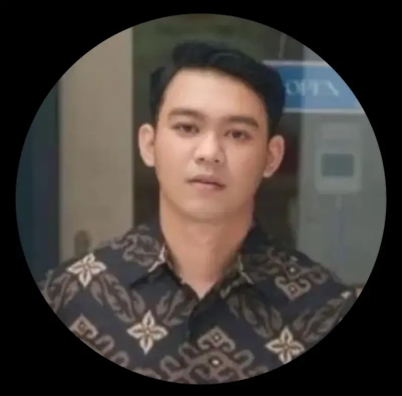 Person In Patterned Shirt Indoors