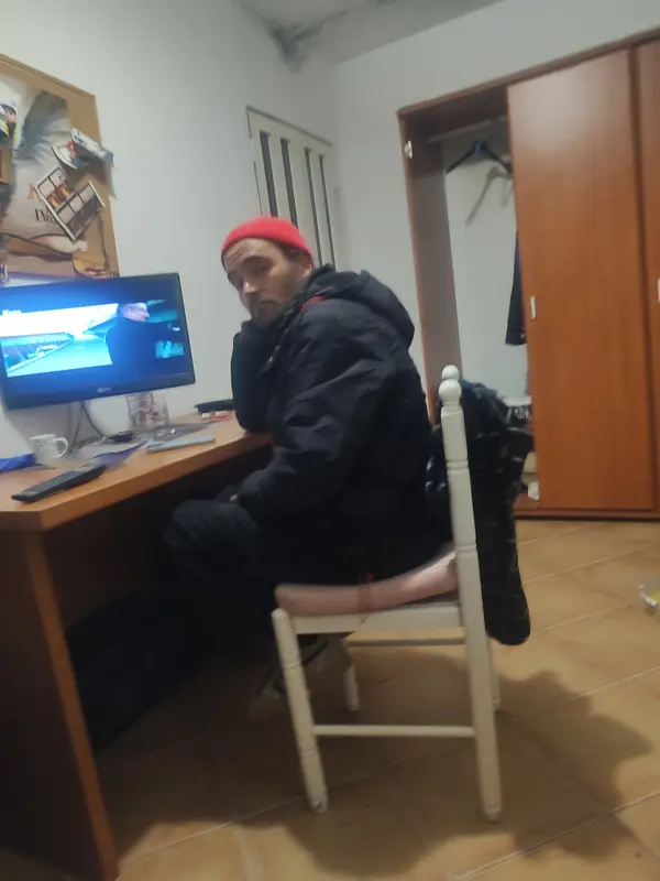 Person Sitting At Desk