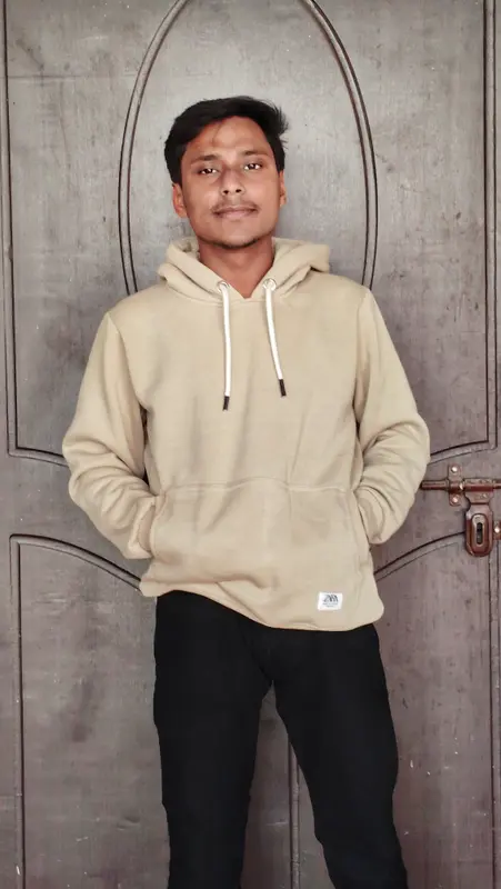 Person Standing In Beige Hoodie