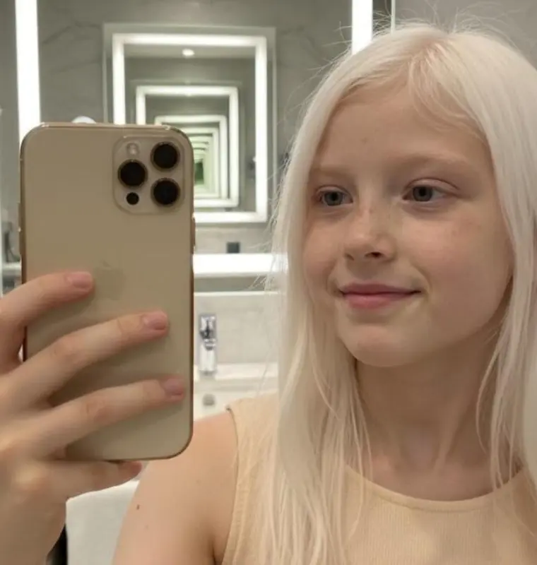 Person Taking Bathroom Selfie.