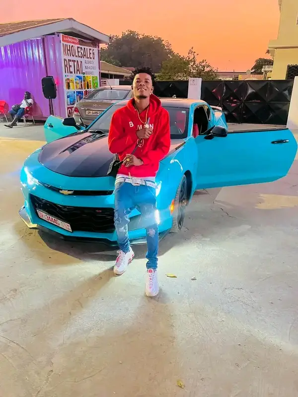 Person With Blue Sports Car