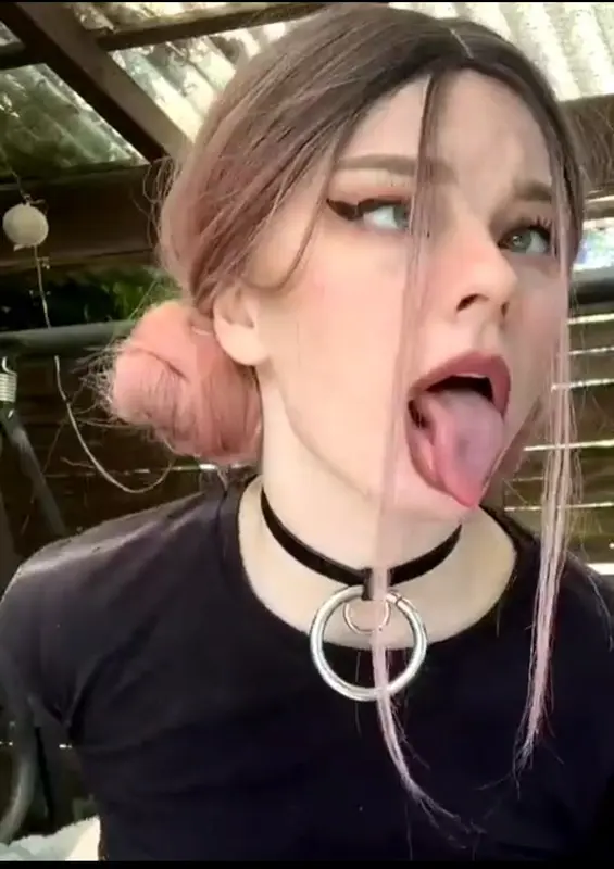 Person With Tongue Extended