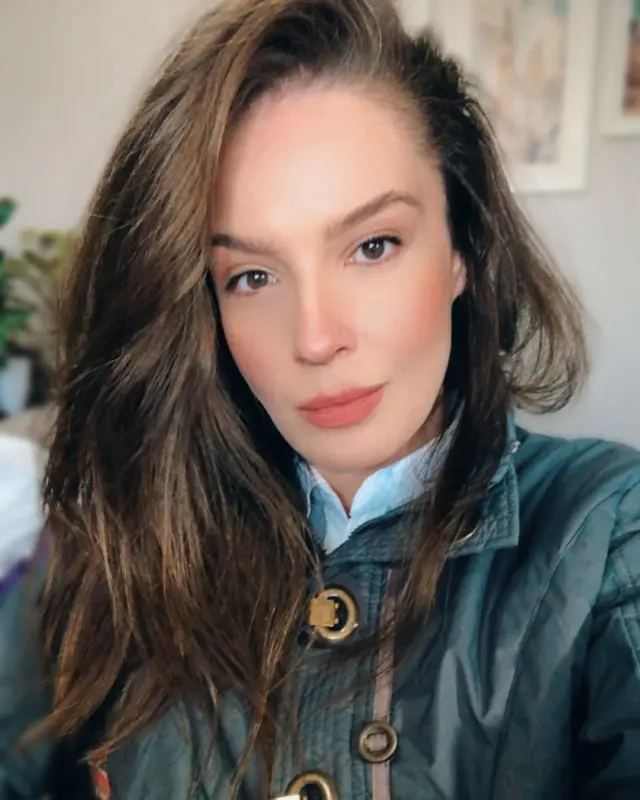 Portrait Of Woman In Coat