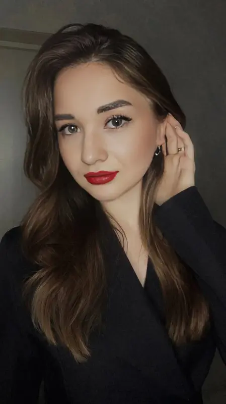 Portrait Woman Adjusting Earring