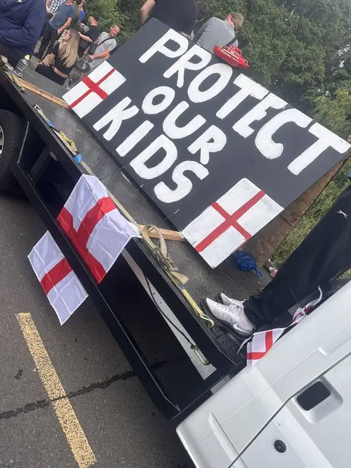 Protest Sign And Flags