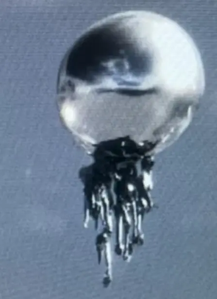 Reflective Orb With Metal Drips