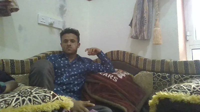 Seated Person In Room