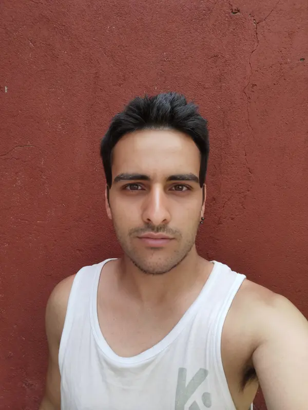 Selfie Against Red Wall