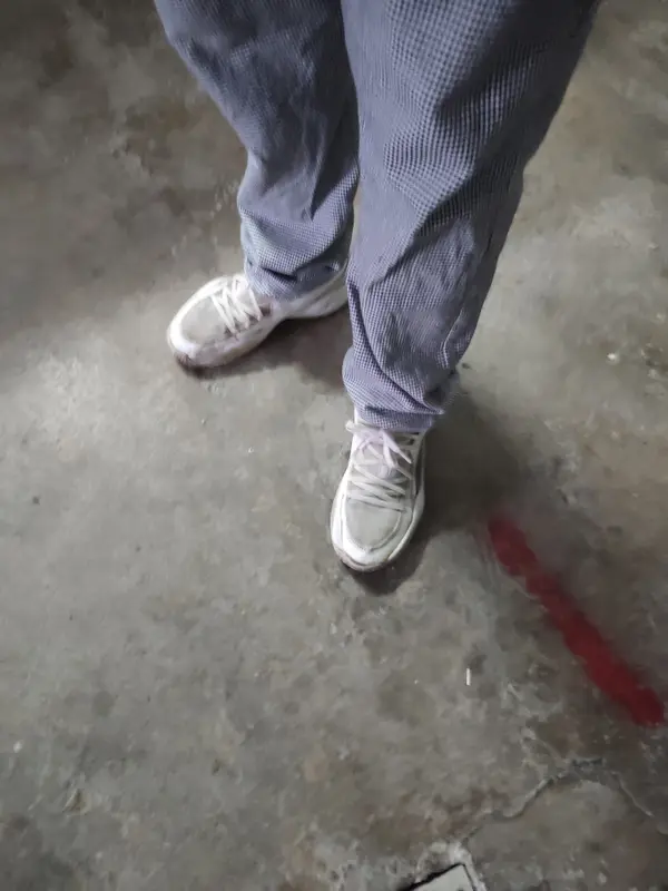 Shoes And Pants On Concrete