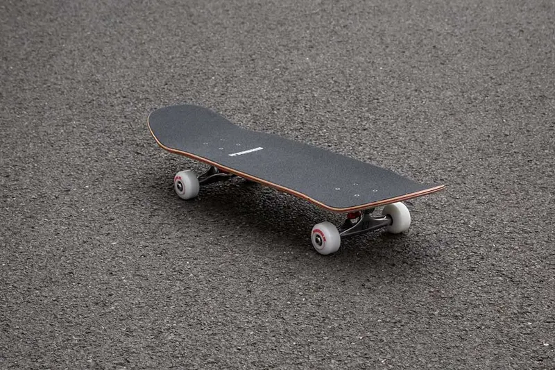 Skateboard On Asphalt Surface